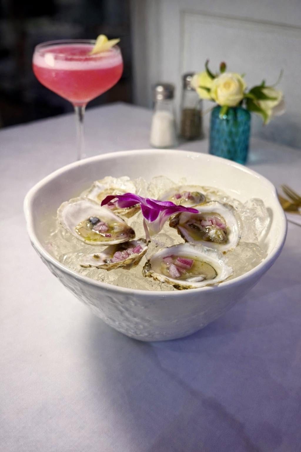 East Coast oysters on ice with a cocktail